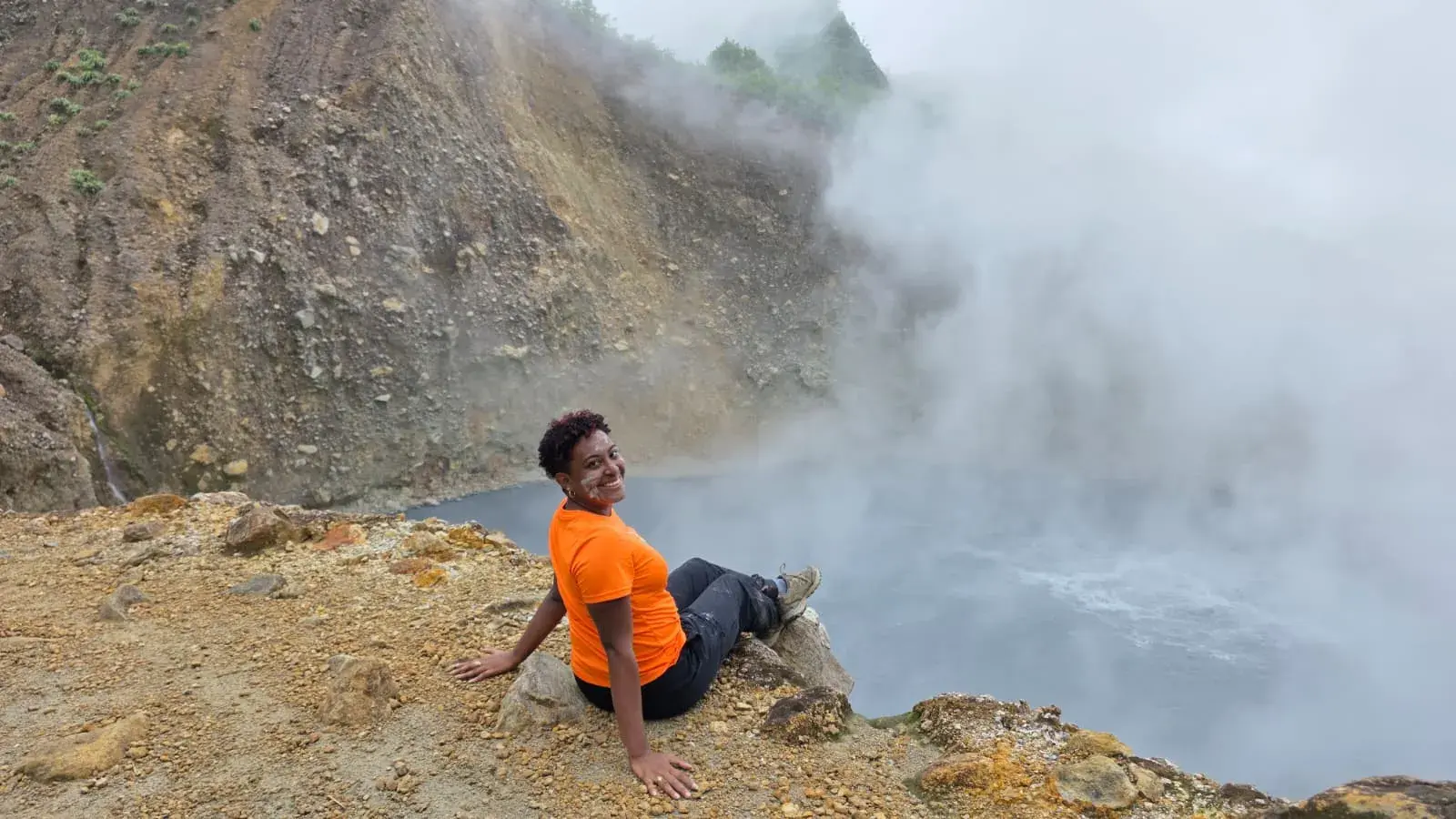 A guest at the edge of Dominica’s steaming Boiling Lake
