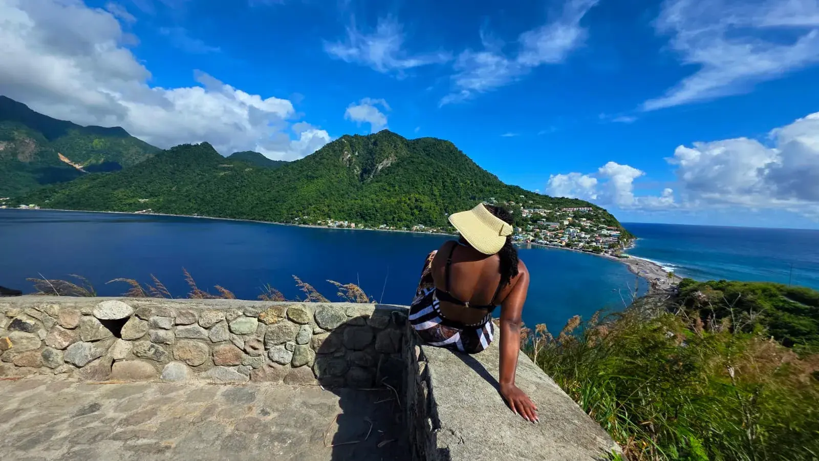 Scenic view over Dominica’s blue south-coast bay on the Champagne & Hot Springs tour