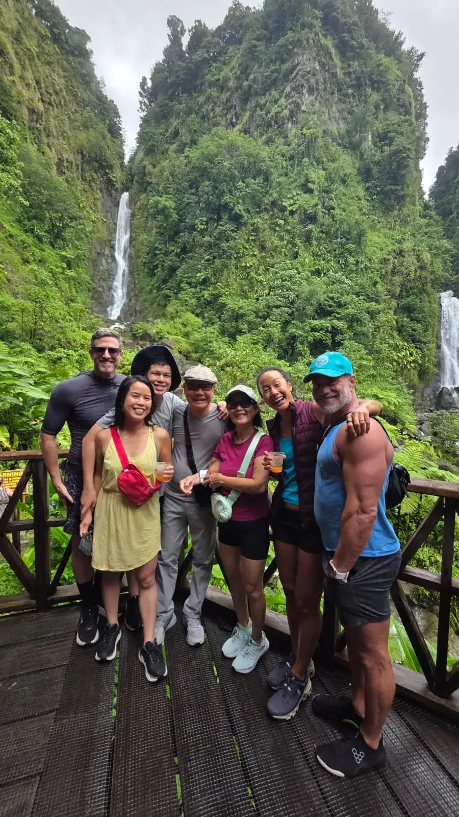 Chasing Adventure Tours guests at a twin rainforest waterfall in Dominica